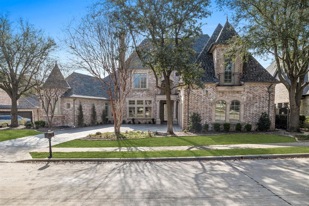 Stunning updated modern estate located in the highly desired gated & guarded Stonebriar Village. This luxurious Sharif Munir custom build offers a location close to The Star, 121, and DNT. Step into the grand foyer and be captivated by marble floors, winding staircase, and jaw dropping imported chandelier.  Boasting 5 bedrooms, including two master suites on the main level, and 6.5 bathrooms, with dual California closets & his and hers bathrooms adding an extra touch of luxury.Indulge your culinary passions in the chef's kitchen, meticulously designed with hand-selected luxurious leathered granite from Brazil. The kitchen features top-of-the-line appliances, custom cabinetry, and a spacious island. Entertain in the Bandara custom theater & maintain a healthy lifestyle in the impressive home gym. The backyard presents breathtaking views of the tranquil community pond and fountain, creating a serene retreat for relaxation and outdoor gatherings. Dont miss list of updates and video