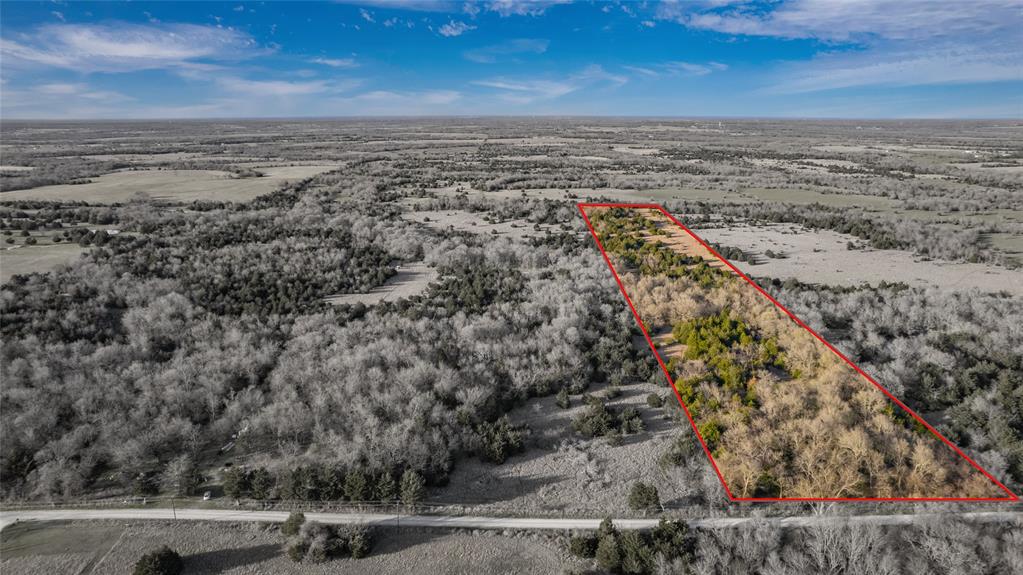 Hunters paradise!! Picturesque place to build your country home or have a weekend getaway! Get away from the hustle and bustle of the big city and build your forever home on this beautiful piece of property. Just minutes to I-30. AG exempt.  Outside city limits. No restrictions. Surveyed out of a 46ac tract.   Note: Electricity and water are available at the road but meters have not been purchased or set on the property.