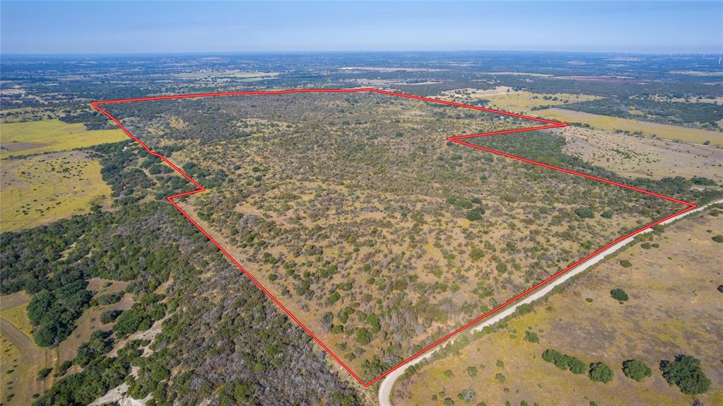 Stunningly beautiful 450 Acre ranch conveniently located 20 miles SE of Brownwood, Texas or approximately 8 Miles NE of Zephyr Texas. This ranch is one of the most unique properties to hit the market in recent years. The ranch is secluded and has rolling rugged topography with 1750-1790 feet average elevation offering panoramic views of the surrounding Hill Country. Spur Mountain crosses the South portion of the ranch with elevation reaching 1800-1820 feet and offers views for miles while providing a wildlife sanctuary. The tree coverage ranges from short underbrush on the hill tops to Mature Live Oaks, Elms and other hardwoods in the bottoms and valleys of the ranch. This ranch is a Native Grass working cattle ranch with above average range conditions and excellent hunting. There are two stock tanks and one water well on the property proving plenty of water to livestock and the wildlife. This ranch has good access with electricity and a water well on site making it easy to construct a lodge or home for its new owner. This ranch is a blank slate and has endless potential for its new owner to make it their own. The beauty of this ranch is second to none and must be seen to appreciate. The market is increasing and now is the time to invest. Call listing agent to schedule a private showing.