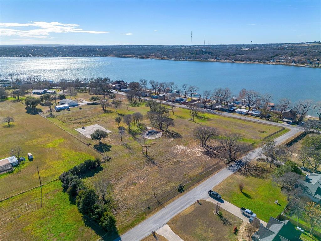 Discover the perfect place to build your dream home with this beautiful lake-view lot overlooking Lake Weatherford. Enjoy peaceful surroundings and scenic views while being just minutes from the water. Whether you love boating, fishing, kayaking, or simply relaxing by the lake, this location offers the ideal setting for lake life.
Design the home that fits your vision—create a modern lake house with expansive windows and outdoor living spaces, a cozy cottage-style retreat, or a custom luxury home that captures the beauty of the surrounding landscape. These spacious lots provide the flexibility to build a home that blends comfort, style, and nature.
Wake up to tranquil lake views, spend your days enjoying outdoor recreation, and unwind in a setting that offers privacy, serenity, and the charm of lakeside living.

Come experience the beauty and lifestyle of Lake Weatherford living.

Each lot , 9-13, are also listed individually.  Estimated acreage if purchasing as a whole is 2.08 acres.