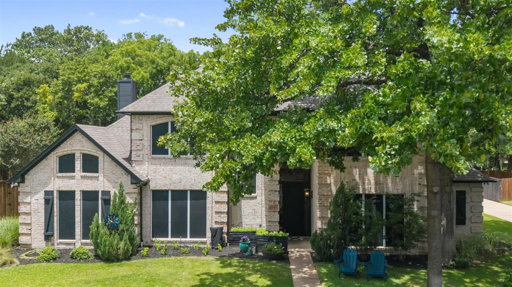 Nestled beneath mature trees on a beautifully landscaped 0.517+-acre lot, this custom-built Denton estate offers a rare blend of timeless elegance, exceptional craftsmanship, and resort-style living. Stunning German schmear brick exterior, circular drive, and lush grounds create a memorable first impression, while over $84,000 in updates reflect the extraordinary care invested. No HOA is a bonus.
Inside, 5,119 square feet unfolds with luxurious refinished hand-scraped hardwood floors, newly replaced carpet, soaring spaces, and 3 gas-log fireplaces. Designed for both grand entertaining and comfortable everyday living, the home features 5 bedrooms, 4 full and 1 half bath, 4 living & 2 dining areas, enclosed sunroom, in a two-story floor plan, setting the tone for warmth and sophistication. Sky lights throughout!
A gourmet kitchen showcases a massive island, granite counters, abundant cabinets, breakfast bar, pantry, electric cooktop, oven, and microwave. Living and dining spaces flow effortlessly, creating inviting gathering areas.
Oversized primary suite, a true retreat, features a dual-sided fireplace and spa-inspired bath with an enormous walk-in shower, dual shower heads, soaking tub, separate vanities, 2 walk-in closets, and a versatile adjoining room-perfect as an office, fitness room, or reading lounge.
Upstairs, a second primary suite offers its own loft and beautifully remodeled en-suite bath, accompanied by an additional living area and 2 bedrooms connected by a Jack-and-Jill bath. A main-level bedroom near the entry provides flexibility as a guest room or executive office. A custom laundry-mudroom makes everyday life easier.
Outside, your private backyard oasis awaits. Enjoy the sparkling pool with removable safety fence and cover, covered outdoor living center with built-in grill, expansive lawn, mature trees, and privacy fencing. This is far more than a home—it is a place to gather, celebrate, and create lasting memories for generations to come.