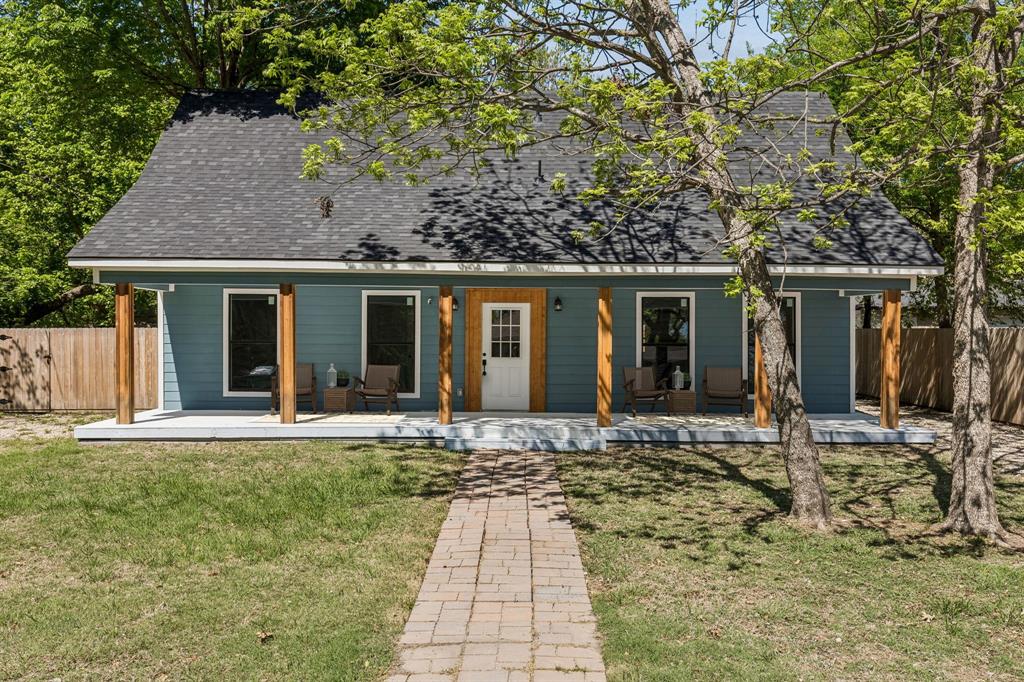 Experience the rare opportunity to own a beautifully reimagined residence where timeless character meets modern construction standards. Originally built in 1945 and now fully renovated, this 3-bedroom, 2.5-bath home offers nearly 2000 sf of thoughtfully redesigned living space that lives and feels like new construction without altering the original footprint. Every surface, system, and finish has been upgraded, including all new
windows, LVP flooring with carpet in bedrooms, and granite countertops, delivering a true move-in ready property for buyers seeking quality craftsmanship and contemporary style. Buyers searching for a move-in ready home with extensive upgrades, modern finishes, and long-term value will recognize the appeal of this exceptional offering. The level of renovation makes it effectively new in condition, providing peace of mind and a refreshed living experience. From the moment you arrive, the inviting front porch sets a welcoming tone, ideal for relaxing mornings or evening unwinding. Inside, the interior showcases a cohesive design with updated materials, fresh finishes, and a functional layout that maximizes both comfort and usability. The spacious living areas flow seamlessly into a modernized kitchen, creating an ideal environment for everyday living and entertaining. The primary suite offers a private retreat with an updated bath and generous proportions, while secondary bedrooms provide flexibility for a variety of uses such as workspace, hobby room, or guest accommodations. A notable feature is the detached double-door garage positioned at the rear of the property, which includes a workshop area along with storage and additional parking options. This property stands out in today’s market as a heavily renovated home that delivers the feel of new construction while preserving its established location.