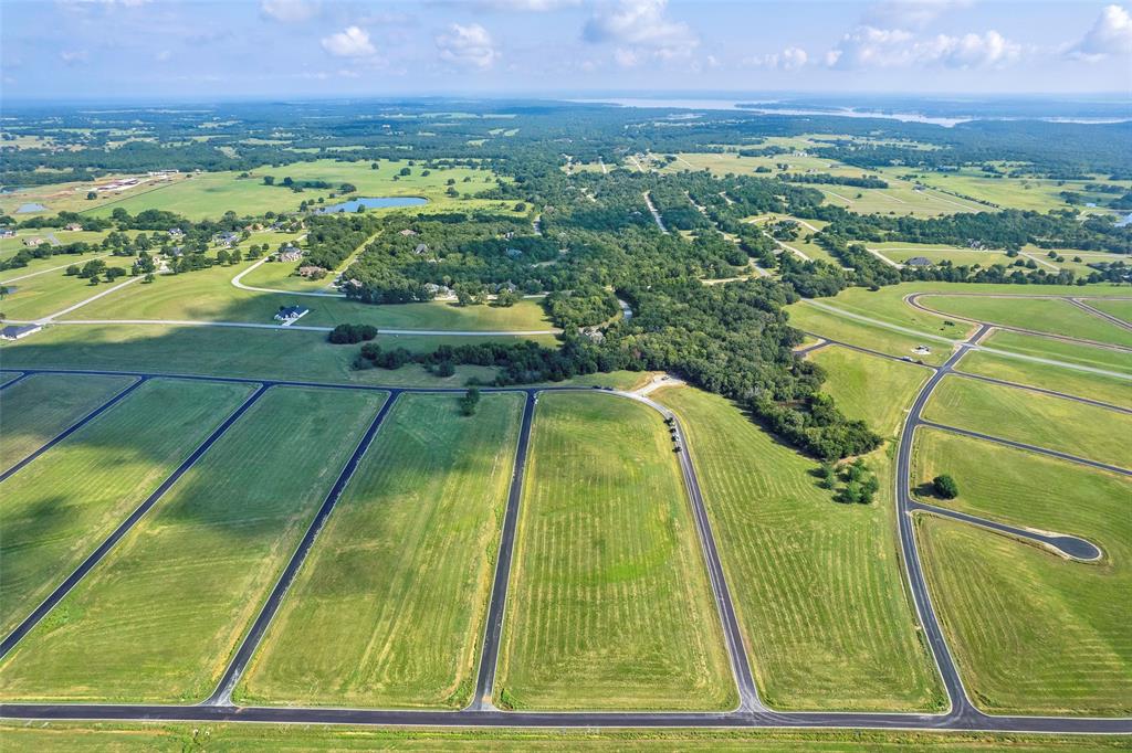 Sold as a package with adjoining lot at 100 Sailfish. Combined price for both lots is $60,000. Build your dream home at Rock Creek Resort on Lake Texoma! This 0.37-acre combined corner lot in the desirable Cabo del Sol section is cleared and ready to build, with paved roads and utilities (water, sewer, and power) available at the street. Ownership includes a Nicklaus Design golf membership along with access to resort-style amenities such as a private marina with boat slips, clubhouse and restaurant, resort-style pool, fitness center, tennis and pickleball courts, hiking and biking trails, and 24-hour gated security. Rock Creek is more than a community—it’s a lifestyle, with seasonal events like poolside movies, summer water slides, and community barbecues, plus more group activities on the way. Located just 90 minutes from the DFW metroplex, this lot is ideal for a full-time residence, weekend getaway, or investment, and with no timeline to build, you can begin enjoying resort living today while planning your future dream home.