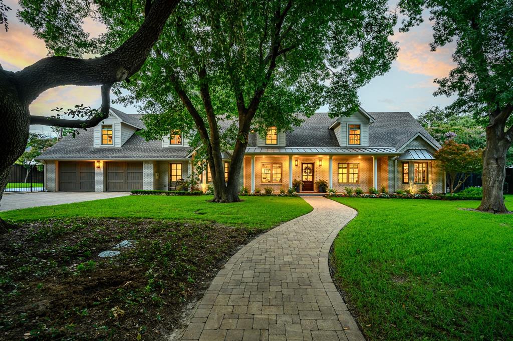 Nestled in a prestigious private school corridor, this charming family home in the Disney Streets combines luxury and convenience. Classically remodeled between 2014 and 2015 by New Leaf Custom Homes, the interior renovation harmoniously blends classic architecture with modern amenities. The foyer leads to an updated downstairs living area. The open-concept layout includes a cozy living room with a gas-log fireplace and Visual Comforts lighting throughout. The gourmet kitchen features high-end Thermador appliances, marble countertops, and an under-counter microwave. The ground-floor primary suite offers a serene retreat with luxurious finishes in the master bathroom. The outdoor living space includes a sports court, sports pool with a chiller, and a pergola with built-in seating, fireplace, and fountain by M. M. Moore Fine Garden and Masonry. Additional amenities include a mudroom with a Friendship Door, a study, and a game room with built-in entertainment.