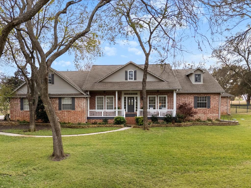 Set on a pristine 1-acre lot in the esteemed Hills of Argyle and within a top-rated school district, this custom Noble Classic Homes estate blends timeless American charm with elevated modern living. Tucked away on a quiet cul-de-sac, the residence showcases refined craftsmanship, a graceful and highly functional floor plan, and an impressive outdoor living environment complete with a built-in grill, resort-style pool, and spa—perfect for both everyday enjoyment and refined entertaining. Inside, the home features a chef’s kitchen with roll-out cabinetry and an induction cooktop, thoughtfully opening to the main living spaces for effortless flow. The serene primary suite offers an oversized bath with a tub-and-shower combination, while guest bedrooms—strategically separated for comfort and privacy—are complemented by well-appointed baths, including one with a large walk-in shower. Additional interior highlights include an upstairs media room, a private fitness space, and an oversized garage with exceptional storage capacity.
Outside, lush landscaping frames expansive areas ideal for recreation and gardening, including a large play-ready yard, mature plantings, and a generous garden with dedicated vegetable and herb sections. The property also benefits from an aerobic septic system, offering efficiency, environmental stewardship, and peace of mind. The quiet cul-de-sac setting provides minimal traffic and a welcoming neighborhood ambiance. A full list of updates and upgrades is available in the Transaction Desk documents. Information provided is deemed reliable but not guaranteed and should be independently verified. Buyer or Buyer’s Agent to verify measurements, schools, taxes, and all other information.