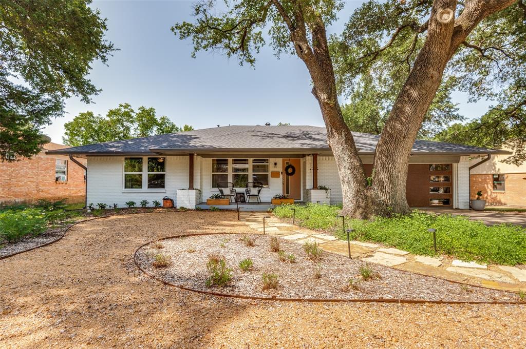 Looking for a beautifully remodeled home with a stunning in-ground pool? Don't miss this exceptional opportunity in desirable Oak Park Estates!
Curb appeal shines with professional landscaping featuring drought-tolerant plants and a welcoming covered front porch. Inside, the thoughtfully designed floor plan offers 3 spacious bedrooms, 2  updated baths, a formal dining room, and two inviting living areas. The remodeled kitchen boasts quartz countertops, a center island, stainless steel appliances, and opens seamlessly to the cozy family room with custom built-ins and a gas-log fireplace. The primary suite is a true retreat with a beautifully renovated en-suite bath. Original hardwood floors add warmth and character throughout the living spaces, while tile flooring provides durability in the wet areas. Beat the Texas heat in your private backyard oasis! The sparkling in-ground pool is complemented by a variable-speed pump (2023) and removable mesh safety fencing. A spacious deck, added in 2024, creates the perfect setting for entertaining, outdoor dining, or simply relaxing. Major updates provide peace of mind, including a new roof (2022), HVAC system (2021), sewer line replacement (2024), and garage door (2024). With extensive improvements throughout, this move-in-ready home is one you won't want to miss. Be sure to review the complete list of features and updates in the documents.