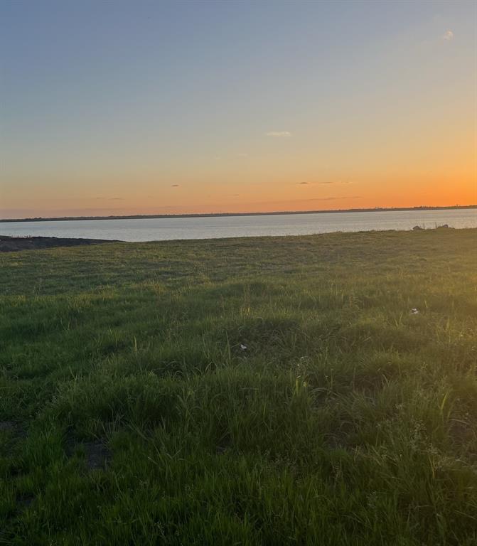 2006 Noe Blvd. is a beautiful .45 Acre waterfront property! One of the few remaining buildable waterfront properties in Heath, TX. The buyer will have the ability to design and build their own custom home at this location with no restriction on a construction start date. The seawall has already been constructed and in place. 

In addition to the .45 acres the property has an additional 0.38 areas that can be leased back from the City of Dallas. The Property is in a municipal management district. Between the surveyed area and the additional .38 acres that can be leased there is a total of 0.83 Acres.  

Amazing unobstructed waterfront views on lake Ray Hubbard, with access to full amenities at the club house including tennis, pool, gym and club house restaurant. The lot is in a PRIVATE golf course community (golf membership comes at additional cost).