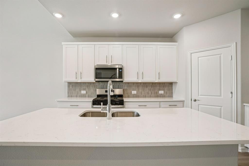 BRAND NEW energy - efficient home Apr 2026! COMING SOON - Skip the theater and enjoy movie night at home from the comfort of the Kessler's second-story game room. White cabinets with veined white quartz countertops, muted beige EVP flooring with light taupe carpet. New energy-efficient move-in ready homes in Dallas-Fort Worth include a washer, dryer, fridge, and whole home blinds, plus they can be closing-ready in 60 days or less–guaranteed. Experience it all: Relax in your private primary suite, enjoy the covered back patio and amenities including a playground and walking trails, all with easy access to Denton, Corinth, and Lake Dallas.