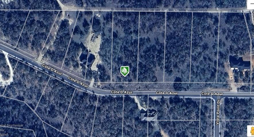 Interior lot with views of Lake Bridgeport just down the street. This is an upscale gated community in the North Star Pointe subdivision. Lake Bridgeport is a 12,000 acre lake that is perfect for boaters, skiers, fishermen, and other water sports. The community features its own private water system, paved streets, and underground utilities. The community pool, boat ramp, day slips and pickle ball court at North Star Pointe are available to all owners. Come out to enjoy the lake.