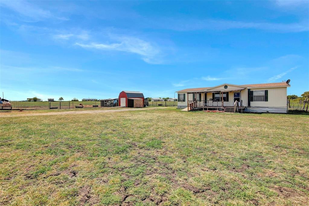 COME BUILD YOUR DREAM HOME OR BUSINESS WITH NO BUILDING RESTRICTIONS!
This 3.6 acer lot holds so much potential Build your dream home on this beautiful corner lot with water and electricity already available. 
The property has two electricity meters for the RV or future man cave shop.
Located right next to Skydive Dallas, enjoy the parachuters falling from the sky on your front porch.
Property is fenced in all the way around the 3.6 acres and also has a chicken coop, storage shed and additional parking for an RV. 
Property is sold as is. Buyer is responsible for survey.