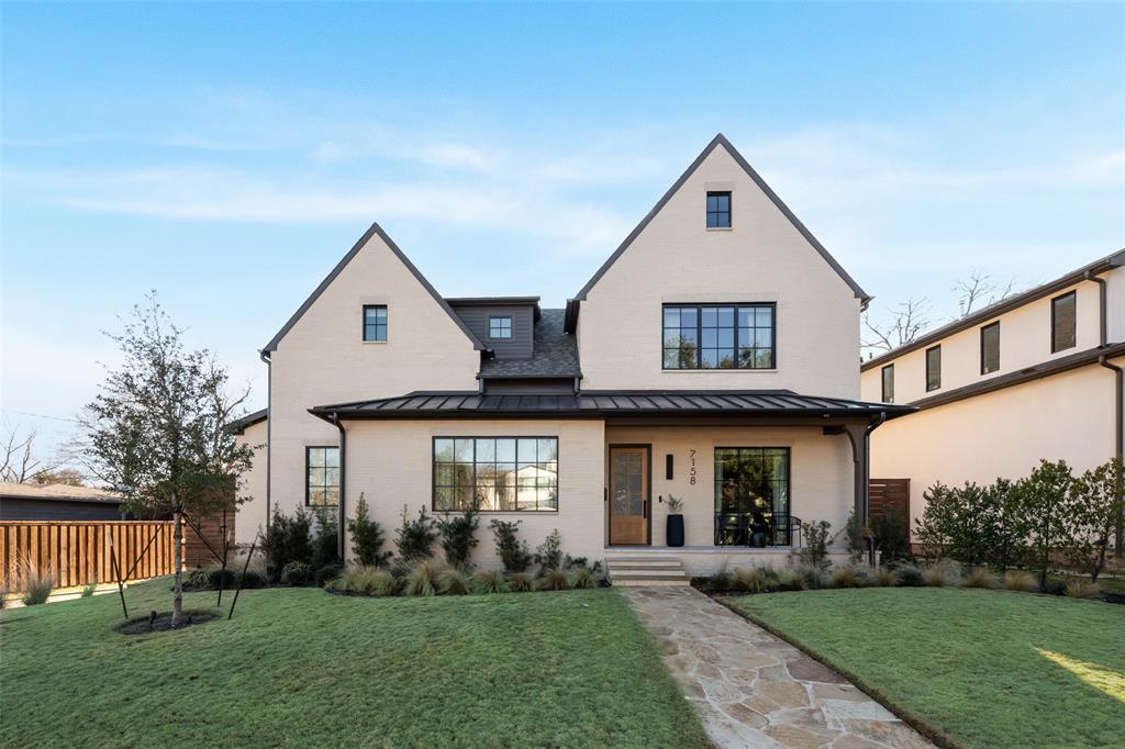 Lakewood custom-built contemporary by Montgomery Homes that elegantly balances everyday living with high-end design at every turn. With 4,882 SF between the main house and the full guest house, this property is packed with living, entertaining, working, and relaxing spaces. The open concept living room is the perfect example of how elegance meets functionality with a modern kitchen boasting clean lines, custom rift cut white oak cabinetry, Taj Mahal quartzite center island, Gaggenau induction cooktop, built-in Thermador appliances, and a pantry and prep kitchen with second sink, double ovens, ice maker, and refrigeration drawers. The light from the wall of glass and double-height ceiling washes over the warm wood accents and gas log fireplace with stone surround. The downstairs master retreat boasts marble and honed granite surfaces, Victoria + Albert tub, steam shower, dressing room, and ensuite office. The main floor is rounded out by the elegant dining room, bespoke powder bath, laundry room, and mud room with loads of storage. Upstairs you’ll find a second living room and three bedrooms with ensuite baths. The outdoor oasis begins with the sparkling pool that sits next to the covered living and dining patio with fireplace and ends with the built-in grill station.

The 770 SF guest quarters features an open concept living-dining-kitchenette space, a bedroom, and a full bathroom. It’s the perfect guest house, office suite, third living room, additional play space, or a fantastical man cave or she-shed.

Thoughtful details have been integrated at every turn: white oak flooring throughout; quartzite and marble surfaces; luxury appliances; rift cut oak cabinetry; full exterior landscaping and lighting; electric driveway gate; roofline pre-wired for holiday lighting with interior switch. There’s even a raised-bed garden for your home-grown vegetable fantasies. You won’t find this level of design, craftsmanship, finish and detail in a newly built spec home.