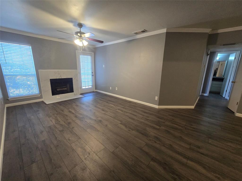 Fantastic opportunity in North Dallas with top-rated Plano ISD schools! This light-filled 2-bedroom, 1-bathroom, 737 sq ft condo features an open-concept family room centered around a cozy fireplace and a separate dining area. Enjoy a desirable split-bedroom layout, a dedicated utility room, and a primary suite with a generous walk-in closet and private access to a covered balcony with extra storage.  HOA includes community pool access, water, and trash. Conveniently located near shopping centers and easy access to major freeways.