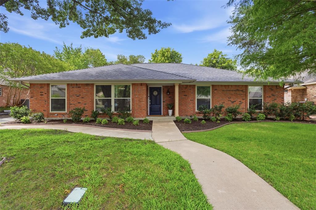 Nestled on a quiet, tree-lined street in an established Fort Worth neighborhood, this classic ranch-style home offers timeless charm. From the moment you arrive, the lush, shaded front yard and welcoming curb appeal set the tone for what lies inside. The formal living and dining room greets you with warm, neutral tones, plantation shutters, and two beautiful pendant light fixtures that add a designer touch. Rich dark hardwood-style flooring flows throughout the entire home, tying every room together seamlessly. The functional kitchen offers white cabinetry, quartz countertops, a classic subway tile backsplash, double wall ovens, and a peninsula that opens to the bright breakfast room — providing everything you need with plenty of room to make it your own. The spacious family room is anchored by a dramatic floor-to-ceiling brick fireplace and vaulted ceiling with exposed beam detail, and French doors that bring in natural light. The primary suite offers a generous tray ceiling, dual windows, and a private bath with dual sinks and a jetted tub. Two additional bedrooms are well-sized, and a flexible fourth room off the garage makes an ideal home office or guest suite. The hall bath features white cabinetry and a skylight. A two-car garage, storage shed, and spacious backyard complete this wonderful property.