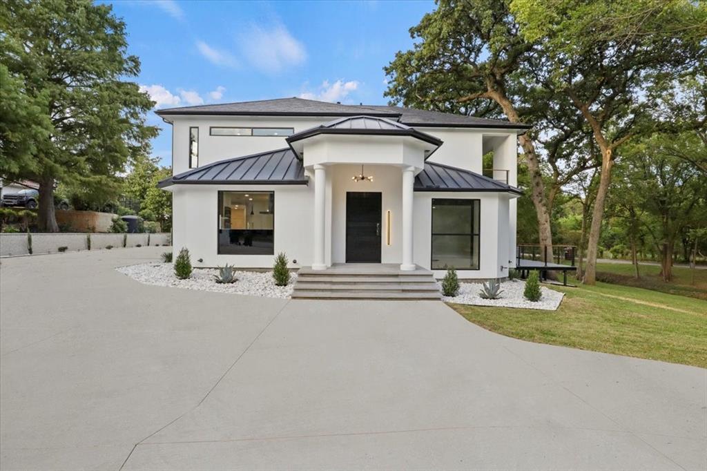 Welcome to 700 garden court, have you been looking for a completely renovated home, with modern finishes? This is the one for you!
This beauty is located in a highly sought-after neighborhood. The home features 4 bedrooms, each with ensuite bathrooms, 2 living areas perfect for entertaining and upcoming holidays. Interior features, hardwood floors, marble kitchen island, viking stainless steel appliances along with smart home technology.  The exterior updates include new stucco, brand new standing seam roof, modern light fixtures and Saint Augustine sod along with turf surrounding the pool. The backyard is truly an outdoor oasis which includes a fully equipped outdoor kitchen, gas firepit, outdoor shower and private seating area surrounded by mature trees creating the perfect outdoor scenery.