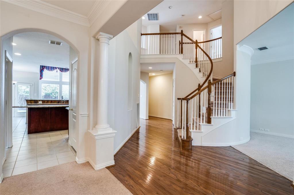 RENT PRICE IMPROVEMENT! This light and bright 4 bdrm executive home is located on a quiet street in the Estates of Russell Creek. With an abundance of natural light flowing through the large windows, this is truly a renters dream home. The spacious eat in kitchen has granite countertops, tons of cabinet space and gas cooktop. Enjoy the soaring ceilings and views into the open and spacious family room. Neutral paint colors make decorating easy. Beautiful real hardwood floors throughout lower level.  Spacious downstairs master bedroom with en-suite bath, large walk in closet, and jetted tub. Large upstairs game room and 3 bedrooms, one with ensuite is perfect for guests. Fenced backyard. Within walking distance to community pools, tennis courts, soccer fields and neighborhood playground. Walk to Wyatt Elementary and Rice Middle school. Applicants must have min 650 credit score. Non-Smoking only. Current tenants lease expires January 15,2024.