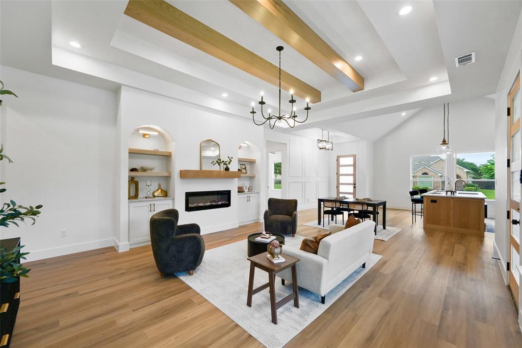 Stunning new construction on a desirable corner lot, this beautifully designed 4-bedroom, 2.5-bath home offers modern elegance and thoughtful details throughout. Step inside to an open-concept layout featuring soaring ceilings, abundant natural light, and designer finishes. The spacious living area showcases a sleek fireplace with custom built-ins, creating the perfect focal point for relaxing or entertaining.The chef’s kitchen is a true showstopper, complete with a large waterfall island, quartz countertops, custom cabinetry, stainless steel appliances, and stylish pendant lighting. A dedicated dining space flows seamlessly from the kitchen, ideal for hosting gatherings. The private primary suite offers a luxurious retreat with a spa-inspired bath and generous closet space, while the additional bedrooms provide flexibility for guests, a home office, or growing families. Situated on a corner lot, this home offers added privacy and curb appeal. Conveniently located near major highways for easy commuting to Dallas and Fort Worth. Enjoy nearby attractions including Joe Pool Lake, Lynn Creek Park, Tails ‘N Trails Dog Park, and The Parks Mall at Arlington for shopping, dining, and entertainment. Move-in ready and built with quality and style—this home is a must-see. OPEN HOUSE: Sat & SUN 12-3pm