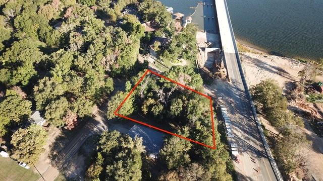 Come Build on YOUR PIECE OF TEXAS! Corner lot mostly cleared with some mature trees, near boat launch location. This is the perfect spot to build your dream home just a few minutes from Cedar Creek Lake, one of the largest lakes in Texas and home to great boating and bass fishing. Just over an hour from Dallas, retreat to the lake for relaxation after a long day in the city to proudly live your best life in your custom home.