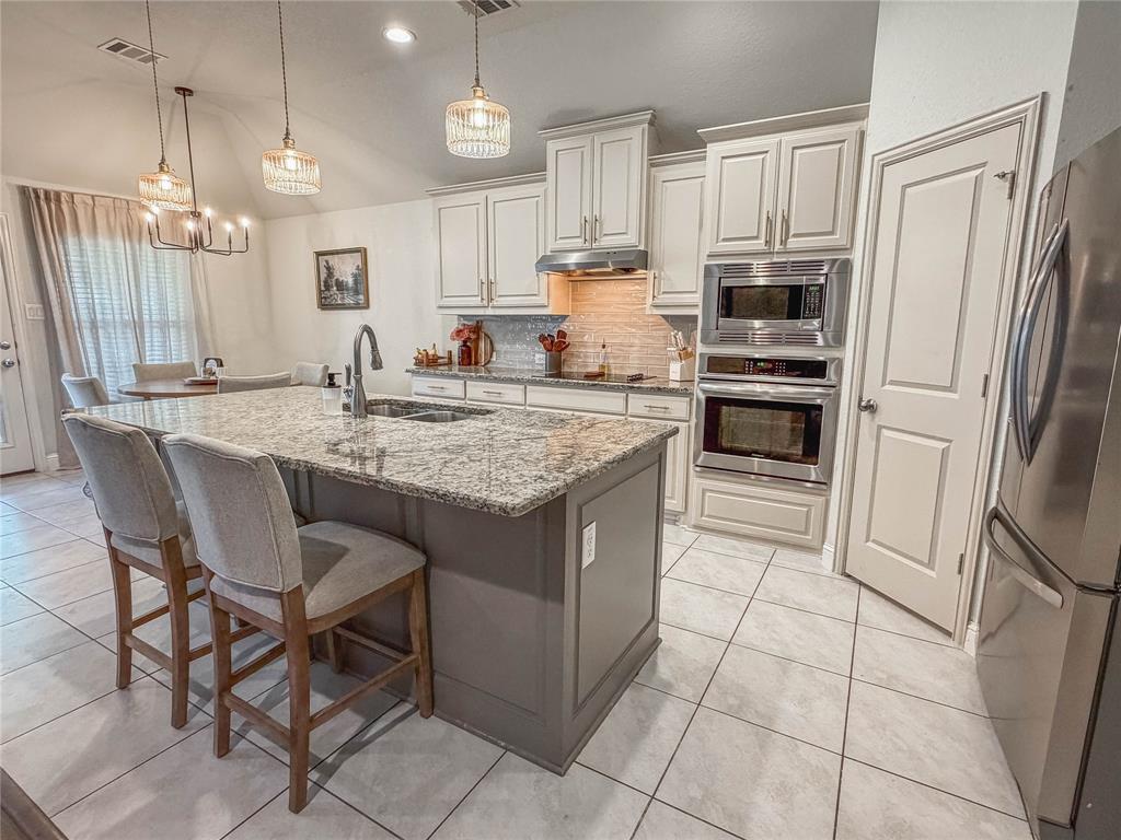 From the moment you arrive, this thoughtfully updated J. Houston home welcomes you with comfort, style, and a sense of easy living. The current seller has invested thousands into totally transforming the backyard to include the pool, spa and extending the patio in 2024, but with changing circumstances its now ready for you to enjoy. Featuring NEW luxury vinyl plank flooring throughout (no carpet anywhere), updated fixtures, modern fans, a refreshed front door, and smart exterior lighting designed to save you both time and money. A spacious entry opens into an inviting living area with a cozy fireplace, flowing seamlessly into an entertainer’s kitchen with a large island and a generous breakfast nook perfect for gathering. The desirable split-bedroom layout offers privacy, while the secluded primary suite serves as a peaceful retreat with a luxurious bath and expansive closet. Step outside to the covered patio - ideal for quiet mornings or unwinding at the end of the day. Nestled in a quiet Cove subdivision with access to a community pool, park, walking trails, shops and restaurants. This home also includes approximately two years remaining on the foundation warranty from J. Houston Homes. Washer, dryer, and refrigerator are negotiable with the right offer, and a full spec sheet with paint details is available upon request—making it easy to envision your next chapter here.