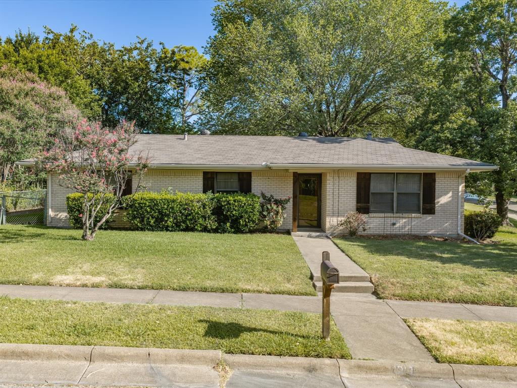 Welcome home to this well-maintained 3-bedroom, 2-bath home offering 1,213 square feet of comfortable living space on a beautifully landscaped corner lot. Built in 1965, this charming home features an attached 2-car garage and a functional floor plan designed for everyday living. The kitchen and bathrooms feature durable tile flooring, while the living areas and bedrooms offer the warmth and comfort of carpet. Step outside to enjoy the covered patio overlooking a small fenced backyard with a storage building—an ideal space for relaxing, entertaining, or enjoying a low-maintenance lifestyle. A 2-year-old composition roof provides added peace of mind for the next owner. Located in a well-established neighborhood, you'll appreciate being within walking distance of Austin Elementary and a nearby park, making it easy to enjoy outdoor activities and community amenities. Conveniently located near shopping, dining, and major roadways, this move-in-ready home is an excellent opportunity for first-time homebuyers, those looking to downsize, or anyone searching for a home with timeless charm and easy upkeep.