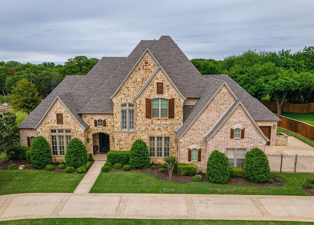 Fabulous executive home located on a private half-acre lot in Palomar Estates in Southlake. This property offers 5 bedrooms, 6 baths, 1 dining area, study & grotto bar which could be remodeled to a 2nd dining room. 3 bedrooms, including the master are on the first floor & 2 are on the second floor with a game room. All bedrooms have en-suite baths. Enjoy the completely renovated chef inspired kitchen with all SS appliances, quartz counter tops & double island with breakfast bar… all open to the light filled breakfast area & oversized living room with stone fireplace. Step into the resort style backyard with large covered patio, pool, spa, & custom putting green all adjacent to a private greenspace perfect for entertaining. Loggia offers electric shade screens and backyard has a complete Mosquito Nix system for your outdoor enjoyment. 3 car garage & Carroll ISD. Control4 entertainment system, security cameras and TVs have an estimated value of $100,000 & all remain with the property.