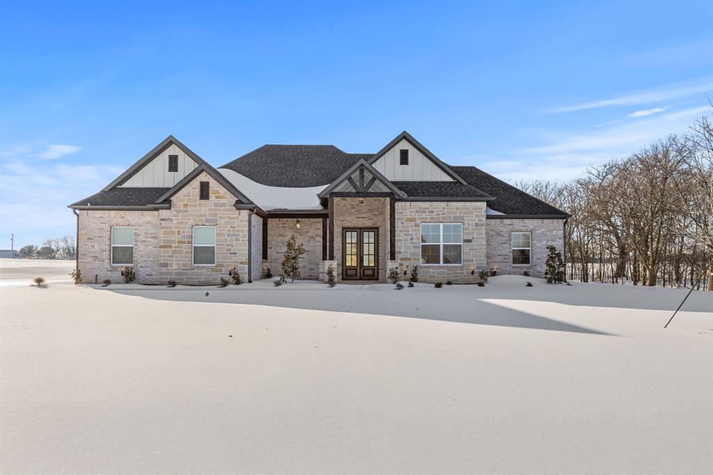 TGC Custom Homes – Oak Plan
Crafted by a premier North Texas builder, this 4-bedroom, 2.5-bath Oak Plan offers modern comfort with timeless craftsmanship. Nestled on a 2.97-acre treed lot, the setting provides both shade and serenity, while the well water adds long-term value and sustainability.
Inside, an open floor plan creates effortless flow for daily living and entertaining, anchored by a cozy fireplace. Step outside to enjoy peaceful views from the covered front and back porches, perfect for relaxing mornings or quiet evenings. The back porch even has a fireplace so that you can be cozy on cool fall evenings. With quality design, natural beauty, and the space you’ve been searching for, this Oak Plan truly feels like home.  All information is deemed reliable but not guaranteed. Call TGC Custom homes today! Buyer and Buyer's agent must complete their own due diligence.