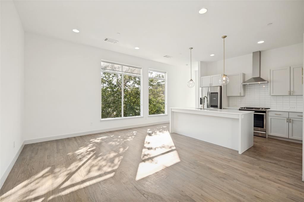 Front corner unit at The Block on Bennett boasting a spacious fenced front yard, hardwood floors, and modern finish outs! Entry level contains a private 2 car garage and with a utility room with washer & dryer connections. The main level has plenty of natural light in addition to an open floor plan perfect for entertaining. Kitchen features stunning white quartz countertops, large island, gas cooktop, stainless steel refrigerator, dishwasher, built in microwave, and much more! Small balcony sits right off living room with sliding doors. Upstairs, you will find 2 spacious bedrooms each with en suite bathrooms. Community dog park behind the unit. New paint throughout the unit! Don’t miss your chance to live close to some of the city’s best shopping, dining, and nightlife with easy access to major freeways, Park Cities, White Rock Lake, and Downtown!