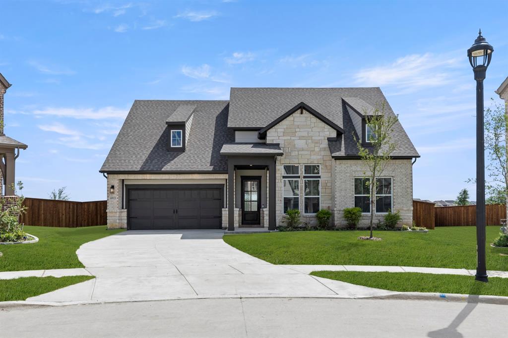MLS# 21263024 - Built by Ashton Woods Homes - Jun 2026 completion! ~ Welcome to the Ellington by Ashton Woods, a thoughtfully designed one-story home offering just over 2,700 square feet, featuring 3 bedrooms, 3 bathrooms, and a versatile flex room with the option to convert into a fourth bedroom. As you enter through the foyer, you’re welcomed into a spacious and open layout designed for both everyday living and entertaining. At the heart of the home, the expansive family room flows seamlessly into the dining area and kitchen, creating a natural gathering space filled with light and connection. The modern kitchen features a large eat-in island, shaker-style cabinetry, ample countertop space, and a walk-in pantry. Covered patios located just off both the family room and dining area create multiple opportunities for indoor-outdoor living, whether entertaining guests or enjoying a quiet evening at home. Privately positioned at the back of the home, the primary suite offers a peaceful retreat with a spacious en-suite bathroom featuring dual vanities, a soaking tub, walk-in shower, linen storage, and a large walk-in closet with direct access to the utility room. Two secondary bedrooms are thoughtfully located on the opposite side of the home, each with nearby access to full bathrooms for added comfort and privacy. Near the front hallway, a flex room provides endless possibilities—ideal for a home office, fitness room, playroom, or additional guest space. For added flexibility, this room can also be converted into a fourth bedroom to better fit your lifestyle needs. Thoughtful design details, open-concept living spaces, and intentional separation between private and shared areas come together to create a home that feels both functional and inviting—designed to support the way you live every day.