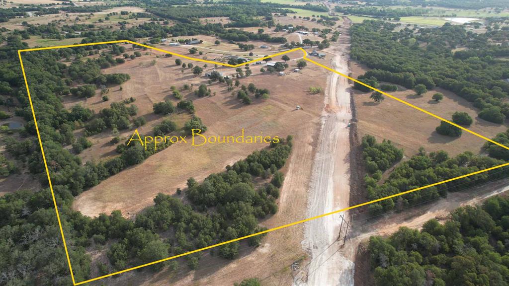 This property has been in the family for 114 years, 5 generations. 52 acres with large pastures and lots of trees. Fully fenced and cross fenced. The house is 2600 ft, 3-2-2. An older house with large bedrooms, huge family room, separate living room, big kitchen, and wonderful utility. Garage is oversized. Magnificent covered front and back porches for watching the sunrise and sunset. Numerous outbuildings with electricity. 2000 sq ft barn with electricity and water, including RV parking with pad. 2 fenced areas close to the barn for livestock. Separate area with 2 loafing sheds. There is a small tank on the property. Horses, Cattle, chickens, you can have it all. Good Hunting and recreational property.