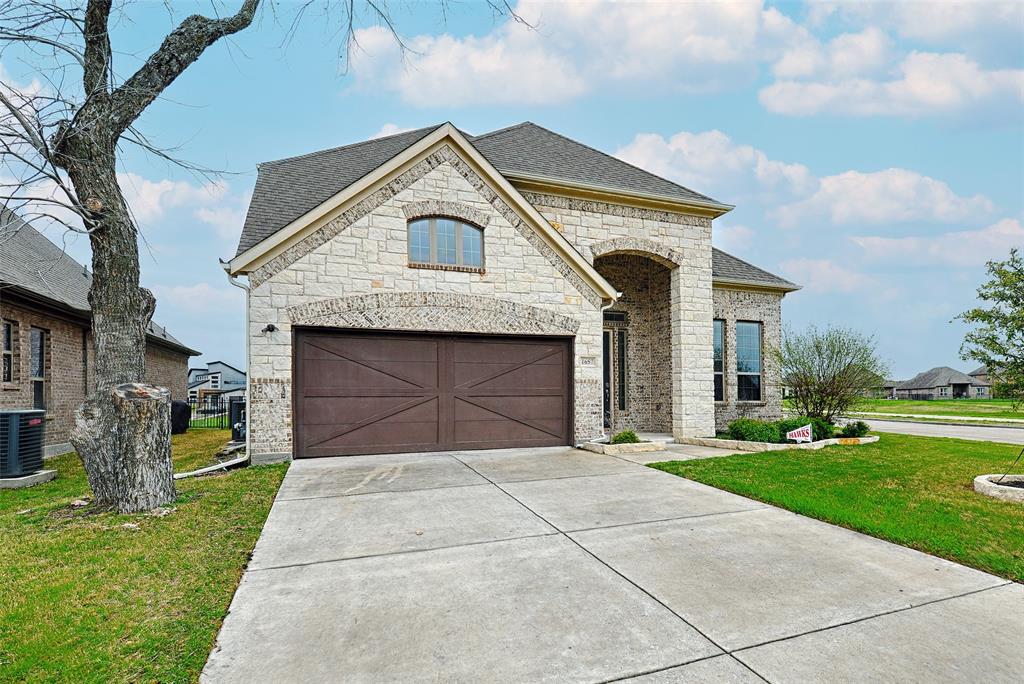 Welcome to 1657 Sonnet Dr, located in the heart of Heath Golf & Yacht Club.

Soaring ceilings and natural light create an impressive entry, while the open layout feels comfortable, functional, and easy to live in from the start.

The downstairs primary suite offers added privacy and features dual vanities, a soaking tub, separate shower, and a large walk-in closet.

The kitchen is designed for everyday living and entertaining with granite countertops, stainless steel appliances, an oversized island, and ample cabinetry for workspace and storage.

A main-floor flex room offers space for an office, gym, playroom, or additional living area.

Upstairs includes three additional bedrooms and a spacious second living area, ideal for a game room, media space, or teen retreat.

The backyard features a covered patio with room to relax, entertain, or create your own outdoor vision.

Seller is open to contributing toward buyer closing costs with an acceptable offer. Refrigerator, washer, and dryer are included.

Zoned to highly acclaimed Rockwall ISD and located approximately 23 miles from Downtown Dallas, residents of Heath Golf & Yacht Club enjoy resort-style amenities including a pool with poolside service, private golf, fitness center, pickleball, tennis and sand volleyball courts, private clubhouse with full-service restaurant and bar, pro shop, locker rooms, yoga, massage therapy, and more.

A VA assumable loan is available at a 3.25% interest rate for qualified buyers. Buyer must apply with the current loan servicer and meet all assumption requirements. Contact listing agent for details.