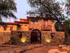 Experience timeless elegance with this stunning proposed custom Spanish-style estate in The Strand, an exclusive gated community featuring only 17 one-acre homesites. Thoughtfully designed with beautiful rock and stucco architecture, this exceptional home blends luxury, functionality, and privacy in one of the most desirable locations in the DFW area.

This spectacular floor plan offers 3 spacious bedrooms, 3.5 bathrooms, a private office, and an impressive media room complete with its own kitchenette—perfect for movie nights. The expansive main living area provides incredible flexibility with ample space for both a grand family room and game room or additional entertaining area.

The luxurious primary suite is a true retreat, featuring two oversized walk-in closets and a spa-inspired bath. Outdoor living is equally impressive with a private front courtyard that creates a welcoming oasis and a large covered rear patio ideal for relaxing or entertaining year-round.

A versatile one-car garage provides the perfect space for a vehicle, workshop, home gym, golf cart, or hobby area.

Situated on a spacious one-acre homesite in The Strand, this is a rare opportunity to customize a truly exceptional home within an intimate, upscale community. Enjoy the perfect combination of privacy and convenience, located just 20 minutes from downtown Fort Worth and approximately 45 minutes from DFW International Airport. Bring your vision and work with the builder to personalize finishes and create your dream home in one of North Texas' premier gated neighborhoods.
Builder incentives available.

The pics in the listing are from this floorplan being built elsewhere. You can customize the plan on your lot.