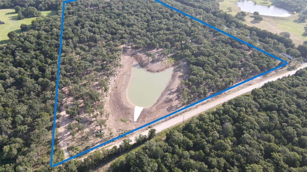 Beautiful piece of property on a quiet road just minutes from lake Ray Roberts. All cedars have been removed. Remaining oaks have been trimmed up off the ground.

Pipe fence on 3 sides of property with no climb wire. Metal gate on left side of property with culvert and rock. Road frontage has been cleared and smoothed for fence and new entry gate.

1.36 acre pond was dug in late 2024 and concrete spillway to control water level was added in mid 2025.

This property is set up perfectly for a family compound and can be subdivided into 2 acre lots with great homesites. Wonderful treed picnic area on NE side of the pond.  The property owner is also a custom home builder with nearly 45 years of experience and has several ideas for a land plan that he would be willing to share.


Property is ag-exempt.