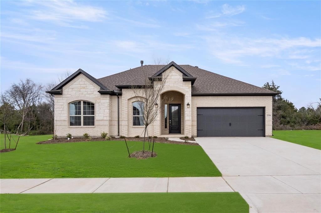 This stunning, meticulously maintained 3 bedroom, 2 bathroom home offers an open concept layout with fireplace in the living room. The kitchen is absolutely an entertainers dream featuring a large island and gas stove and is nice and bright with plenty of storage. This home is designed with 3CM quartz countertops, painted cabinets, upgraded carpet, tile flooring, gorgeous light fixtures and a tiled gas fireplace. In the primary bedroom, there are large bay windows to look out into your peaceful backyard. In the primary bathroom sits a relaxing soaking tub, dual sinks, large walk-in closet and a separate water closet. In addition, this home has a Generac Guardian 26kW generator for storm protection. All appliances stay with the home, including the washer and dryer. This home is a must-see!