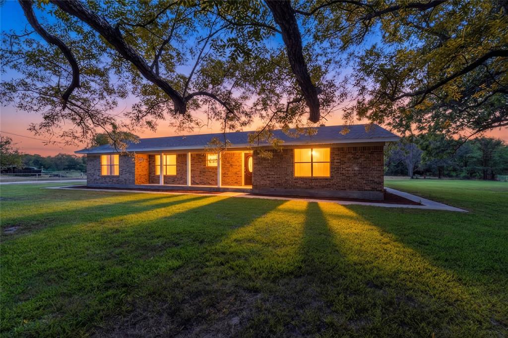 Escape the hustle and bustle and enjoy country living at its finest with this freshly remodeled farmhouse on just over 9 acres! Located in the highly desired Callisburg ISD, this newly renovated 3 bedroom 2 bath home boasts a ton of upgrades such as a new roof, new vinyl siding, new vinyl flooring, new kitchen and bath countertops, 2 new hot water heaters and all new paint throughout- not to mention all of the beautiful mature pecan trees- it truly is a must see! With two large living areas and a fully enclosed sunroom that leads to a covered back patio- this property is ideal for entertaining or hosting large family gatherings. This beautiful piece of land has been a working farm for decades and comes equipped with a 30x60 barn with available water, 100amp electrical service, as well as an additional 20x24 carport on a concrete slab- perfect for storing vehicles or other farm equipment. There are also two ponds on the property making this an ideal setup for livestock. Bring your ideas and turn this into your very own farm or ranch today! Start living the country life while being just minutes from town!