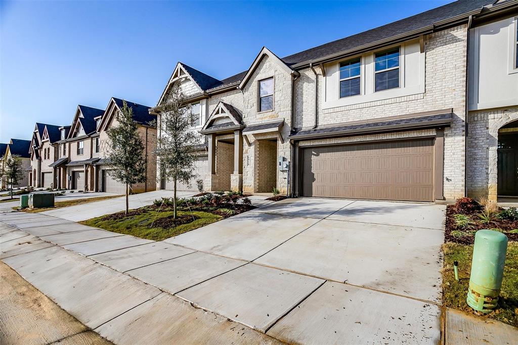 ***limited time $25k flex cash and appliances and blinds package for a limited time***Discover this beautifully crafted townhome in Knight’s Landing on Eden Rd., where modern luxury meets every day ease in a vibrant, connected community. A timeless brick-and-stone exterior, inviting front porch, and rear-entry two-car garage offer both charm and functionality from the moment you arrive.

Inside, an open-concept main level sets the stage for effortless living and entertaining. Durable luxury vinyl plank flooring guides you into a chef-inspired kitchen with an oversized island, stainless steel appliances, custom-painted cabinetry, quartz countertops, and a spacious pantry. The adjoining living area provides a comfortable space to unwind or host friends, while a conveniently placed powder bath adds daily practicality.

Upstairs, the private primary suite becomes your personal retreat—complete with dual vanities, sleek 12x24 tile, a large glass-enclosed shower, and an expansive walk-in closet. Two additional bedrooms, a well-appointed bathroom with double sinks, and a dedicated utility room provide thoughtful separation and convenience.

Step outside to a spacious, low-maintenance yard surrounded by mature trees and backing up to the community trail—perfect for pets, play, and weekend relaxation. Plus, lawn care is included for stress-free living.

Ideally situated near restaurants, coffee shops, grocery stores, parks, and walking trails, Knight’s Landing offers more than a home—it offers a lifestyle. Whether starting fresh or simplifying your space, this townhome blends comfort, style, and convenience into one exceptional address.

Ready in April!