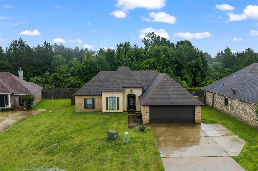 Sitting on a quiet street in Woolworth Oaks neighborhood, this open concept home with a brand new HVAC system is turn key! On a cul de sac with no traffic, no backyard neighbors and an extended back patio! Stained concrete floors with two dining areas and a kitchen island over looking your living room. Timeless, great quality wood stained cabinets throughout the home. Primary bedroom sits on its' own side of the house with double vanity and his and hers walk in closets. Laundry room with mud bench coming off of the garage for convenience and ease of use! No HOA. Schedule your showing today!