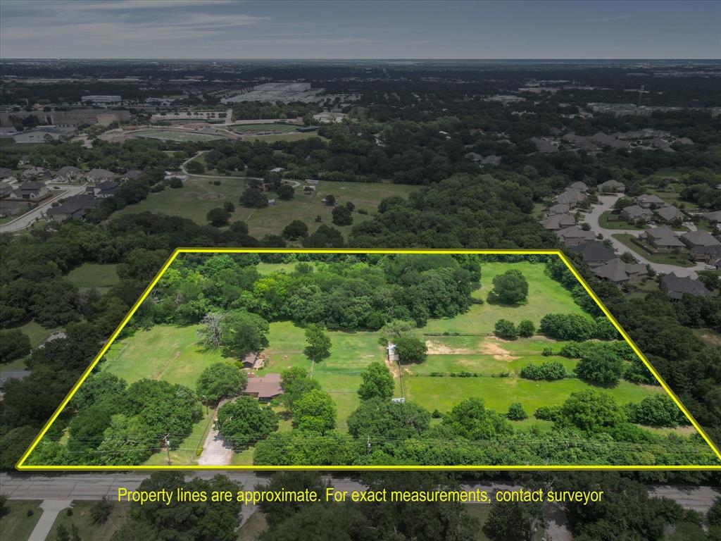 Rare Opportunity in Mansfield, TX — 8.12 Acres with Nearly 800 Feet of Road Frontage
Opportunities like this don't come around often. Nestled in one of the fastest-growing corridors in the Dallas–Fort Worth Metroplex, this exceptional 8.12-acre property in Mansfield, Texas offers the perfect blend of rural charm and premier development potential.
With nearly 800 feet of road frontage, the property boasts outstanding visibility and accessibility — a critical advantage for anyone looking to subdivide into residential lots and capitalize on Mansfield's explosive growth. As surrounding neighborhoods continue to expand and demand for housing remains strong, this land represents a compelling investment for developers, builders, and savvy buyers alike.
Currently improved with a single-family home and several functional outbuildings — including two run-in horse sheds and a livestock structure.The expansive acreage offers ample room for a thoughtfully designed lot subdivision, with the generous road frontage making future access and infrastructure planning straightforward. Buyers are encouraged to conduct their own due diligence regarding zoning, utilities, and subdivision requirements with the City of Mansfield.
Properties of this size, with this much frontage, in this location are increasingly rare, and the window to acquire them is closing fast!
