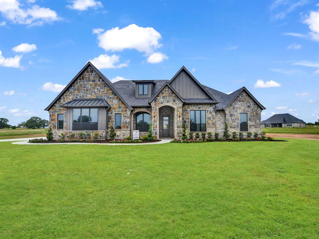 Luxurious LBK Home on a 2 acre tract in the gorgeous Overton Oaks.This custom home has style and elegance. 3005 sq ft home with 4 bedrooms, 3 full bathrooms, an office, game room and Large patio with a wood burning fireplace in Decatur ISD.Exquisite curb appeal paired with timeless finish outs.As you enter the home, enjoy vaulted ceilings with stunning beams, beautiful light fixtures, natural stone and quartz countertops, gas fireplace in the living room with built ins, white oak cabinets, and large windows overlooking your backyard.Oversized rooms and closets, huge walk in pantry, and large utility.Spacious 3 car side entry garage with concrete driveway.Overton Oaks offers underground utilities and a beautiful entrance.LBK homes installs CAT 5 wiring for data.This home will come with gutters, sprinklers, and a landscape package.