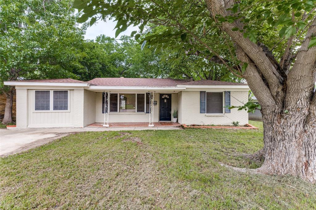 Welcome home to this charming 4 bedroom & 2 bath cutie! Situated in a quite well established neighborhood, this gem has an inviting vibe from the moment you arrive. From the mature trees to the relaxing vision of sitting on the 19x5 covered front porch sipping your morning coffee. Nestled in a great location that's convenient to Parks, Shopping, & Dining & in desirable Birdville ISD. When you step inside, you'll fall in love with the beautiful, handcrafted hardwood floors! Entertain & enjoy conversations in the family room or gatherings in the heart of the home in the generous kitchen, that can accommodate a large table or an island to gather around. A few of the chef's delight conveniences includes gas cooktop, microwave, tile countertop, dishwasher, spacious cabinetry, & a lazy Susan, Plus a generous size utility room. Flexible split bedroom floorplan with the 4th bedroom being more private, making it the perfect space for a study, playroom, or muti-purpose room! The options are endless with your vision bringing it to life & putting your personal touches throughout. Primary bedroom offers hardwoods, closet, an ensuite bath with 2 additional closets, built-in vanity, linen cabinet, medicine cabinet, & a walk in shower. Light & bright windows & paint throughout giving an airy feel & some cheerful accent colors. Ceiling fans in almost every room, removed the popcorn texture on ceilings, added can lighting in living & kitchen areas. Second full bath has separate shower & a jet tub! Double sinks & vanities, brush nickel hardware throughout, and 6 panel raised doors. At the end of the day, unwind & cuddle up or have a cookout & grill under the covered 12x15 back patio that's prewired for a TV. Have fun playing with the kids & pets watching them run & explore the large backyard. Turn the 10x24 Workshop complete with electric into a Man cave, She shed, or Greenhouse! Hot water heater replaced Dec. 2024, Roof in 2017. *Additional recent updates in Private remarks below.*