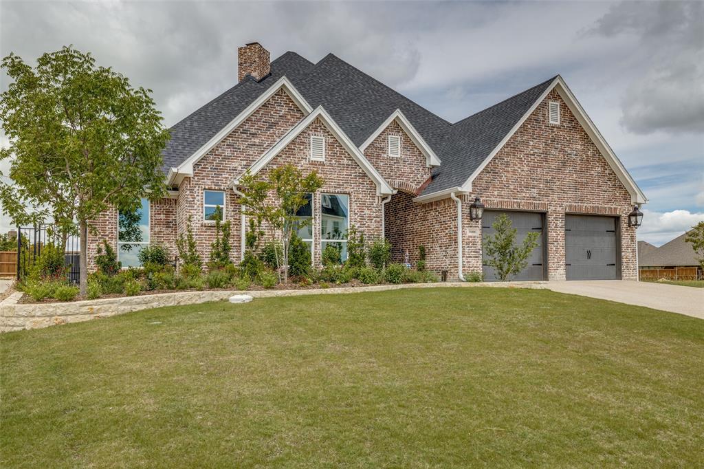 Welcome to 11008 Familia Real, a beautifully appointed home located in the sought-after golf course community of White Stone Heights in Benbrook, TX! 

This thoughtfully designed single-story offers 3 spacious bedrooms, 2.5 baths—including a powder bath with shower and exterior access, ideal for future pool use—and an open-concept layout perfect for both everyday living and entertaining.

Step inside to discover tall ceilings, a family room with a full-size gas-burning fireplace, and a light-filled interior enhanced by solar window tint on all windows. The gourmet kitchen is a chef’s dream featuring quartz countertops, gas range, cabinet-faced refrigerator, custom cabinetry to the ceiling, a full island with cabinetry and elegant hardware, and stainless steel appliances.

The private primary suite includes a spa-inspired bath and a generous walk-in closet. Additional highlights include a garage with custom pebble flooring, full wall and door insulation, a water softener, and mature landscaping that enhances privacy.
Enjoy outdoor living on the covered back patio, complete with a 12-ft extended pitch roofline, solar motorized sunshade, and peaceful views of a beautifully landscaped yard with established trees.

Located in a well-maintained golf course community, residents enjoy close proximity to Benbrook Lake, parks, trails, shopping, and top-rated schools—with easy access to I-20 and Highway 377.

Don’t miss this opportunity to own a truly custom home in one of Benbrook’s most desirable neighborhoods!