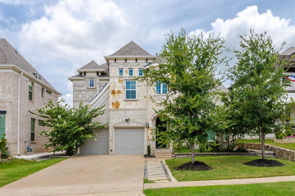 Welcome to 5940 Augustine Rd, a stunning two-story residence built by Grand Homes, located in the highly sought-after master-planned community of Wilmeth Ridge! Built in 2021, this one-owner home showcases elevated ceilings & open-concept living featuring 5 spacious bedrooms, 4 full baths, & multiple living and dining rooms. The grand entry welcomes you with an elegant curved staircase, expansive windows & an abundance of natural light. The thoughtfully designed floor plan offers seamless flow between the living, dining, and kitchen areas making it ideal for both everyday living and entertaining. The main living room overlooks the backyard & is highlighted by a beautiful tile-surround fireplace. The chef-inspired kitchen is equipped with beautiful granite counters, a massive center island, stainless appliances, gas cooktop, butler's pantry & shaker-style cabinetry with upgraded glass-front accents. Conveniently located on the main level, the primary suite offers a relaxing retreat & an impressive ensuite bath featuring a large soaking tub, sep shower with bench seating, dual sink vanity & generous walk-in closet. An additional bed and bath on the first floor provides flexibility for guests, multi-generational living or dedicated home office. Upstairs, you'll find three additional bedrooms, two full baths & an exceptionally spacious game room ready to accommodate your lifestyle needs. Step outside to enjoy the private fenced backyard featuring an extended open patio & front-entry two-car garage that includes storage racks and insulation for added functionality. Stone-lined flower beds and brick-and-stone-accented exterior adds timeless curb appeal. This home is loaded with premium upgrades that deliver stylish features throughout. Residents enjoy impressive amenities including a private lake, pocket parks, swimming pool, playground, hike & bike trails & a community fire pit. Located within highly acclaimed Prosper ISD with quick access to DNT, US-380, & Hwy 75!