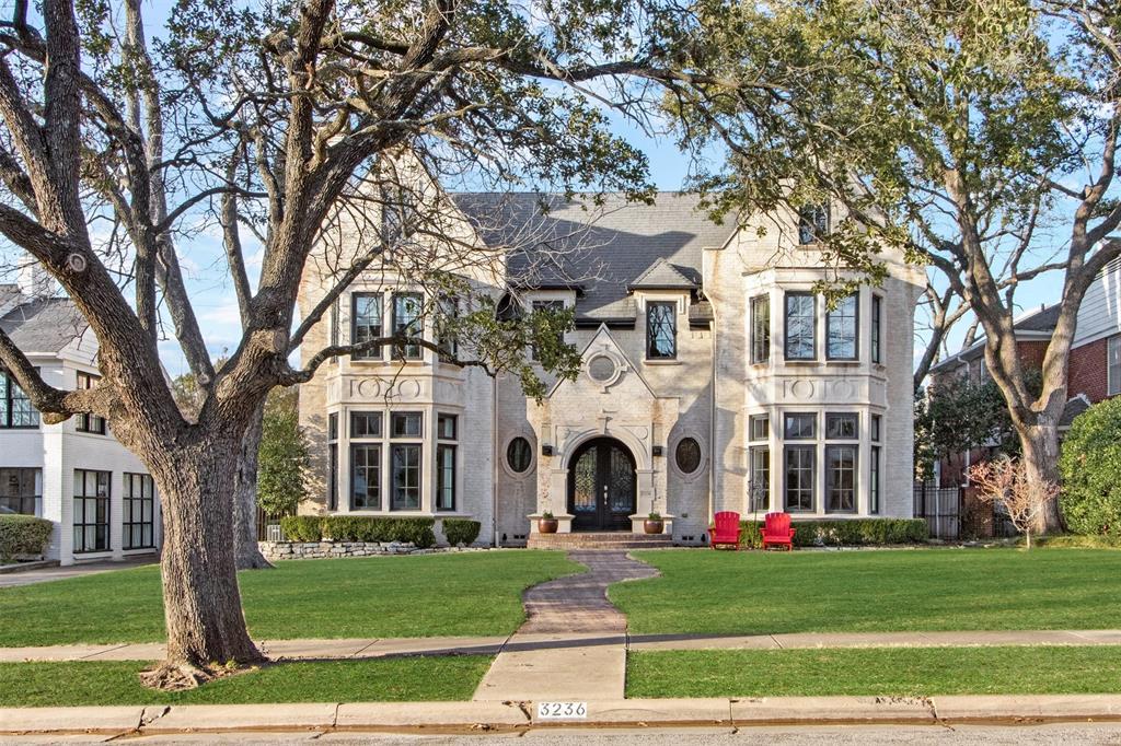 Experience timeless elegance in this stunning University Heights home, zoned for HPISD. The ornate front entry leads to a bright welcoming living room and dining spaces, a wine room, butlers pantry, and breakfast nook. The office elevates a work from home experience with a bay window sitting area, fireplace, and built in shelving. There are four bedrooms with a secondary living space upstairs that would make for a perfect fifth. The primary suite boasts a spacious balcony, a comfortable sitting area around a fireplace, his and hers closets and vanities, and comfortable garden bath. Enjoy movie and game nights with family and friends in the skylit third story media room. Entertaining in this home is a dream come true with a scenic fountain that opens into the kitchen, 2 dishwashers, 3 ovens, a coffee nook, and plenty of storage. Outside you'll find a large covered patio featuring a fifth fireplace and gas grill. This property is ready for a family to embrace life at its fullest.