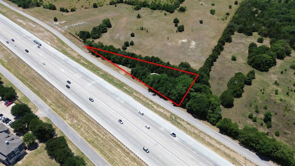 High Traffic Visibility: Situated right off Interstate 35E, ensuring maximum exposure and ease of access. Zoned for Commercial Use: Ready for your business venture or development project. Proximity to Major Markets: Easy access to major highways and a growing business community. Whether you’re a developer looking to bring your next big project to life or a business in need of a prime location, this property offers immense potential for growth and profitability. Don’t miss out on this rare opportunity! Contact us today for more details or to schedule a viewing.  Buyer to verify all information.