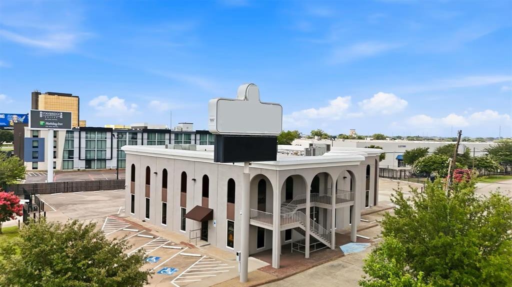 8855 North Stemmons Freeway is a about 12700 sq ft. SF two-story commercial building with prime I-35 frontage, excellent visibility, and 45 secured parking spaces. The property features a 150+ seat sanctuary, auditorium, multiple offices, boardroom, training room, media room, recording studio, and flexible workspace ideal for churches, media companies, nonprofits, educational institutions, or corporate offices. Located minutes from DART Burbank Station and Dallas Love Field, it offers exceptional accessibility and versatile use potential.
