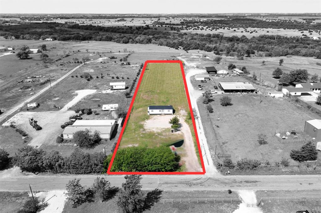 Rare 1.5 acre opportunity in Royse City, prime location near Hwy 66 and I 30!
Unlock the potential of this spacious 1.5 acre property ideally positioned just minutes from Highway 66 and Interstate 30, offering the perfect balance of convenience and country living. With rapid growth in the surrounding area, this is an excellent opportunity to build your dream home or invest in land with long term upside.

The property features a finished 640 sq ft, 2 bedroom, 1.5 bath home that is move in ready and ideal for living comfortably on site while you design and build your future residence toward the back of the property. Or simply a move in ready home if your are looking to escape the city! Enjoy the flexibility and space to create your vision with room for additional structures, outdoor living, or recreational use.

No MUD or PID and no known restrictions, providing added value and fewer limitations. Buyer to verify all information. A mobile home currently on the property will be removed prior to closing, allowing for a clean slate for the next owner.

Located in a highly accessible corridor with easy access to Dallas, shopping, dining, and schools, this property combines location, land, and opportunity all in one.

Don’t miss your chance to secure acreage in one of Royse City’s fastest growing areas!