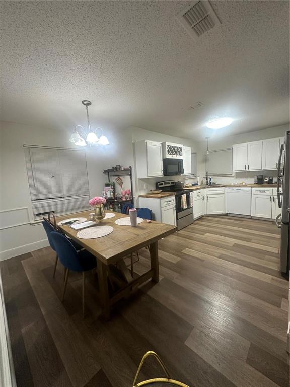 Owner will carry with 5% and no less tat 35% down.  House has been totally remodeled with new flooring, kitchen counters, etc.