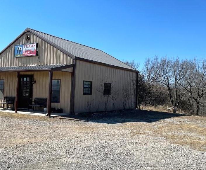 Great Location For Commercial Business! Near New Azle Hill Top Elementary School and Stewart Street. There are Lots of Possibilities With 3.75 Acres And 450 Feet of Road Frontage on S FM 730. This Property Would make A Great RV Park, Multi-Family Development or Retail Venture.  Nice Office Building with Well and Septic, with Access to City Water and Septic.  Property is located in County. There is Great Visibility of a two sided bill-board  to advertise your own business or lease out to other business.