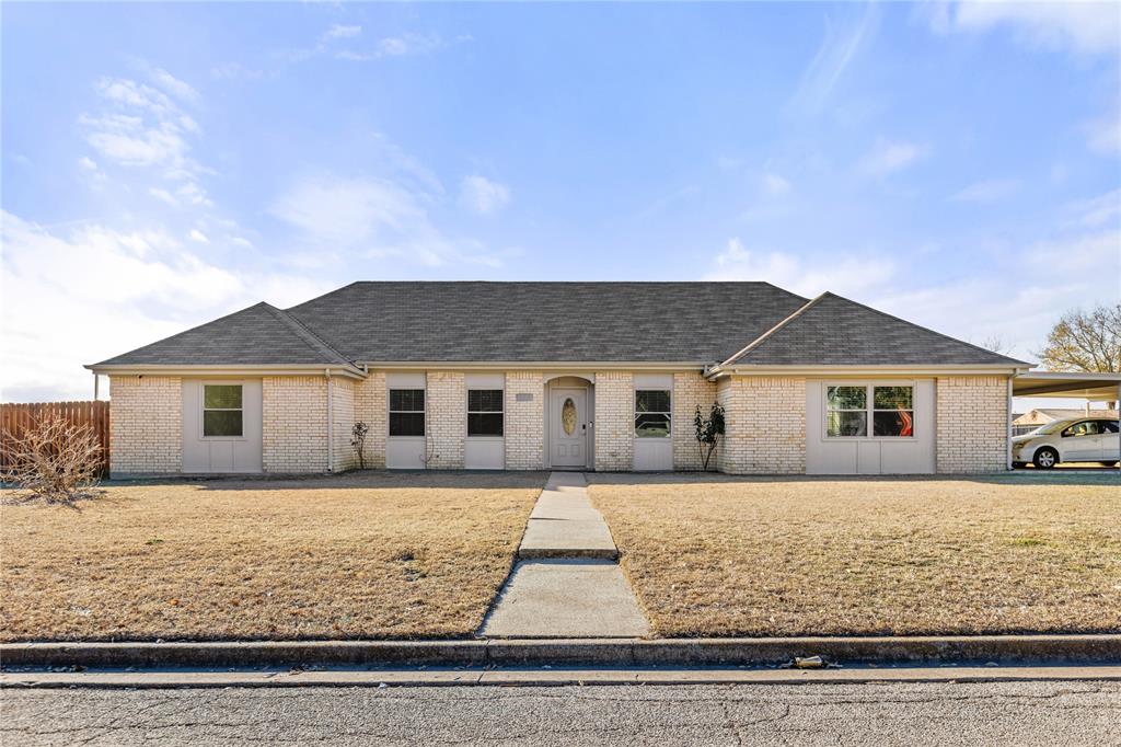Located on a corner lot in Mexia, TX, this 3-bedroom, 2-bath 2 Carport wood burning fireplace with a converted garage with a combined square footage of 2062 sq. ft was built in 1982.  The newly remodeled home offers comfortable living with modern updates throughout. Updated kitchen features a new dishwasher, microwave, and freestanding range, Cabinets, Countertops. Recently updated bathrooms offers a fresh feel with stylish fixtures, updated vanities, and thoughtfully chosen finishes that elevate the home’s overall appeal. Enjoy outdoor living on the covered patio, along with the convenience of a two-car carport and a storage shed for additional storage. A great opportunity for buyers seeking an affordable, move-in-ready home with recent upgrades.