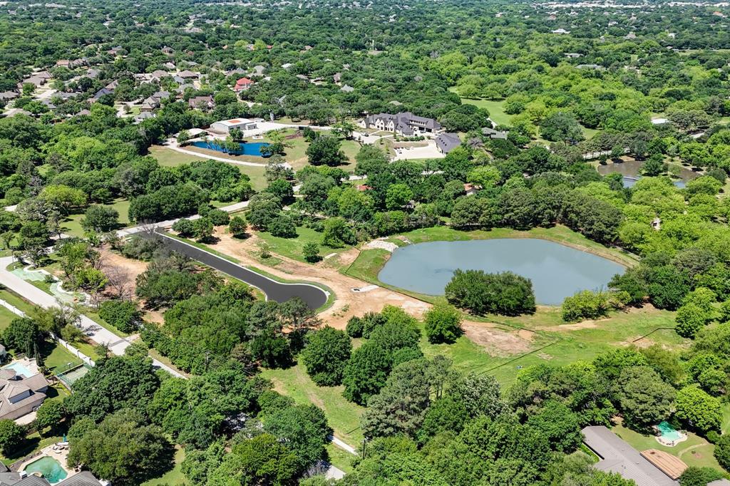 Welcome to Foreman’s Landing, an exclusive new development on Amelia Court in Colleyville, Texas.  Nestled in a serene, countryside setting with all the conveniences of city living, this community offers the best of both worlds. With only five spacious lots available, you have the unique opportunity to create your custom dream home in a private and tranquil environment. All utilities are in place, giving you a head start on building your new home, and you have the flexibility to bring your own builder. Enjoy the quiet charm of country living while being just minutes away from top-rated schools, shopping, dining, and major highways. Foreman’s Landing is your ideal retreat in Colleyville–don’t miss out on this rare chance to own in this premier location!  Please contact agent for additional lot info.