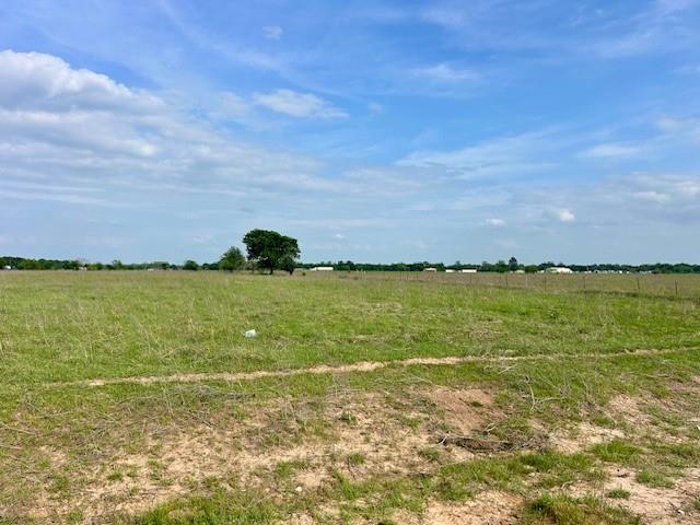 Beautiful 3.22-acre tract offering a blend of open space, privacy, and flexibility. This property features light restrictions and already has valuable AG tax exemptions in place, making it an excellent option for a homesite or investment. Electricity is available at the road, and a water line has already been installed—saving time and upfront costs. Two gated entrances from LCR 463 provide convenient access and multiple layout possibilities for driveways, homesites, or future structures. The land offers plenty of room for a manufactured home, barndominium, or custom build, with restrictions designed only to maintain quality standards within the subdivision. A versatile piece of land with a country feel and practical improvements already in place.