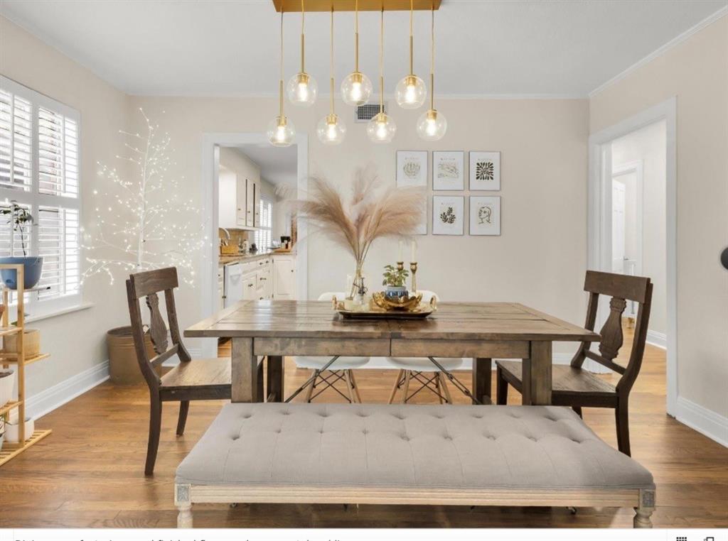 Nestled in the picturesque Oakhurst neighborhood, known for its tree-lined streets and welcoming community, this beautifully updated three-bedroom, two-bath home blends classic charm with modern comfort. As you step inside, you're greeted by refinished original hardwood floors and a fresh, neutral paint palette that flows throughout the main living areas. The inviting front living room features a large bay window—perfect for watching the neighbors go by—and a stunning brick fireplace that spans the entire wall, creating a cozy focal point. Stylish modern light fixtures elevate both the living and dining rooms, while the galley-style kitchen offers efficient use of space for everyday living. Just beyond the kitchen, you'll find an oversized bonus room—ideal for a second living area, game room, playroom, or home office. The spacious primary suite boasts a completely renovated en suite bath, designed with a spa-like touch in calming blue tones. It features a large walk-in shower, modern soaking tub, and double vanity—perfect for relaxing and recharging. Storage is plentiful, with several large closets throughout and not one, but two two-car garages offering flexible options for parking, storage, or a workshop. Sellers have updated electric, new water heater, complete primary bathroom renovation, lighting, paint, flooring, hardwired security cameras. NEW ROOF IN AUGUST OF 2025